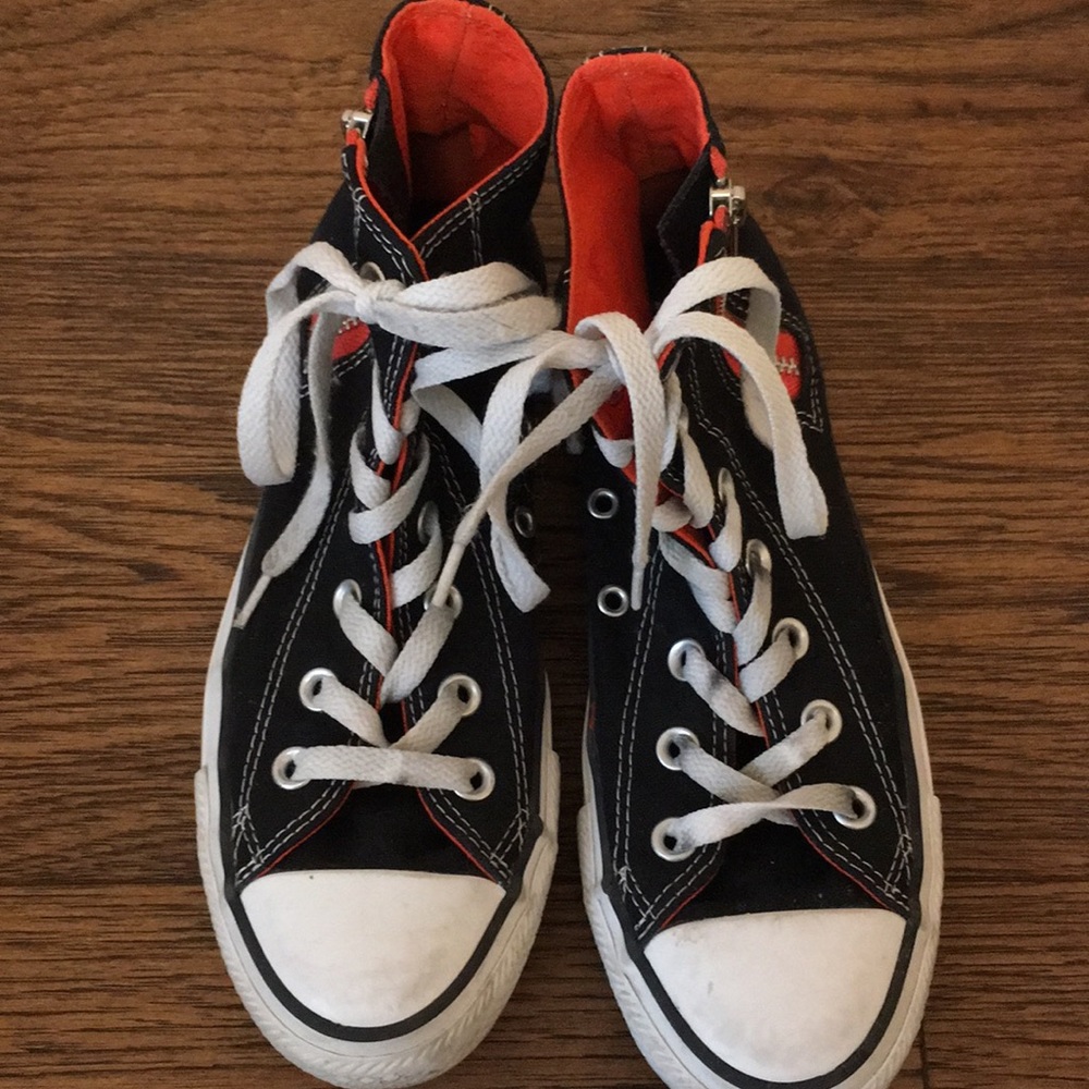 Black and white and coral converse